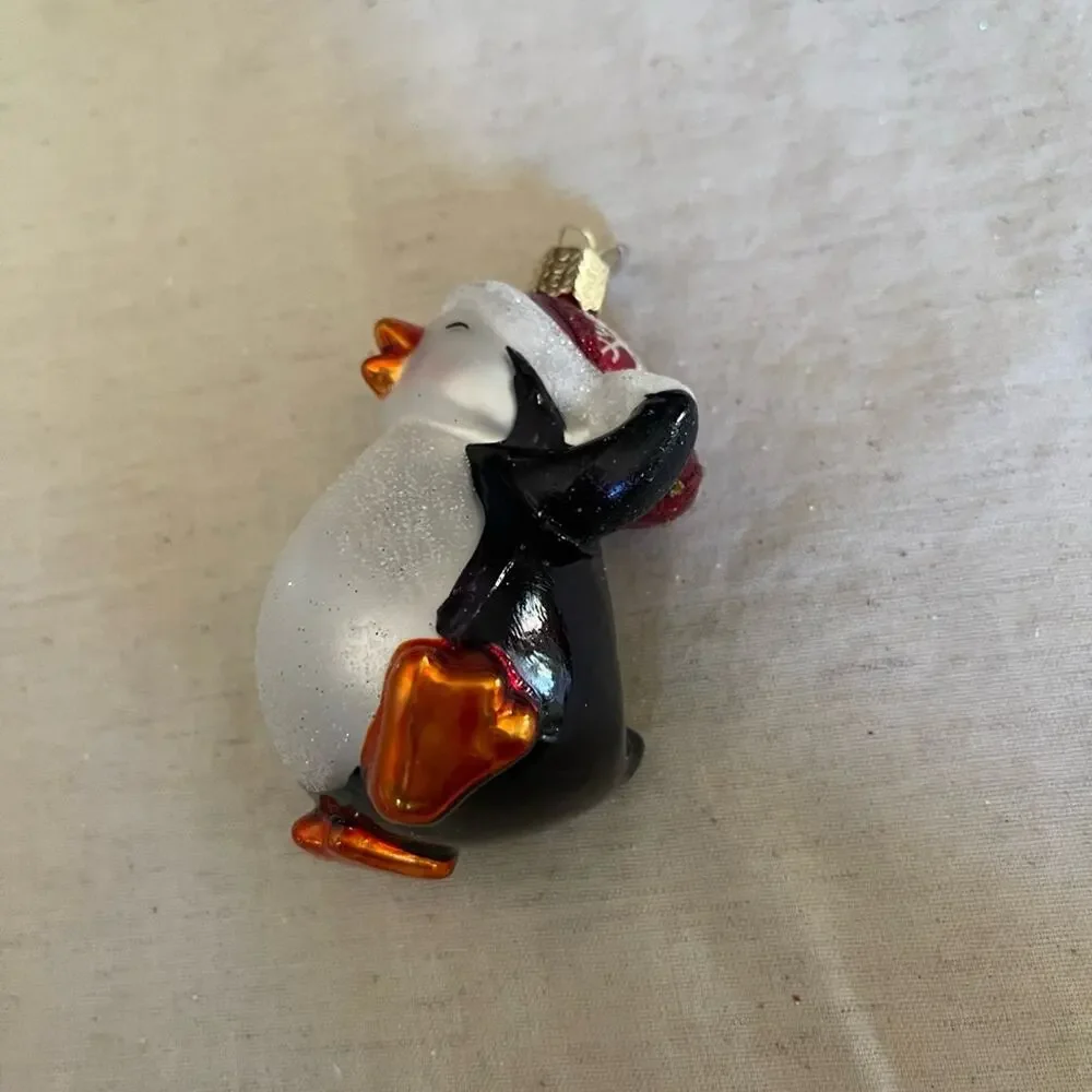 Old World Christmas penguin blown glass ornament